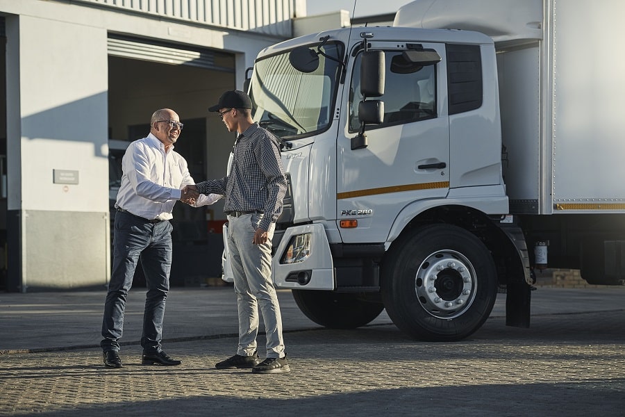 two men shaking hands