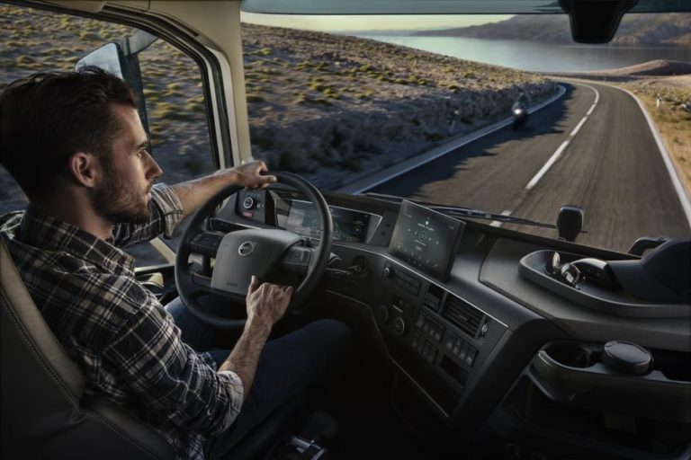 man driving a volvo fh truck