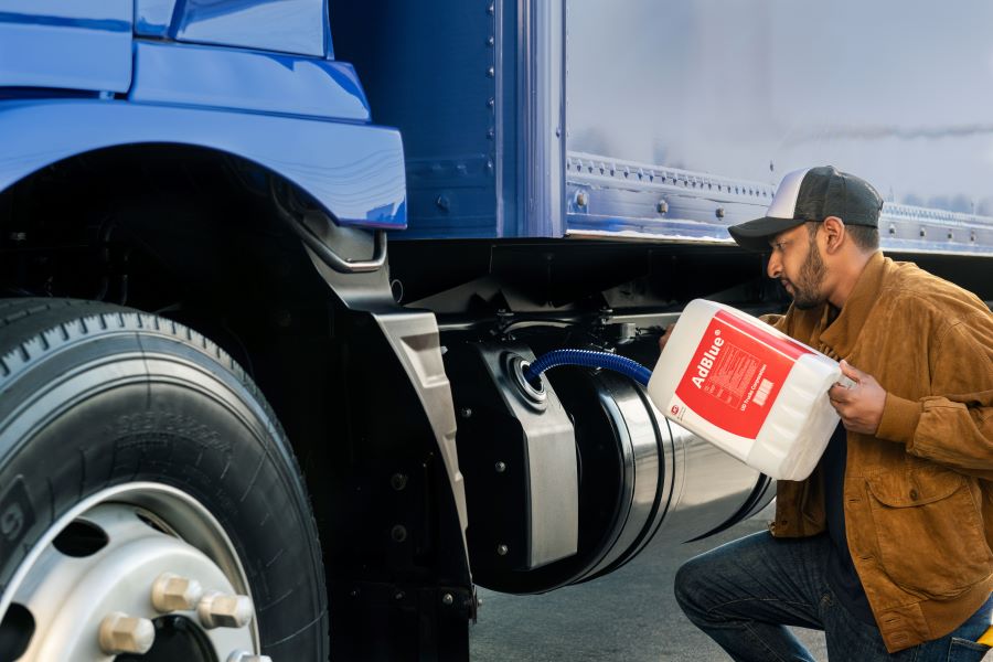 man maintaining a truck